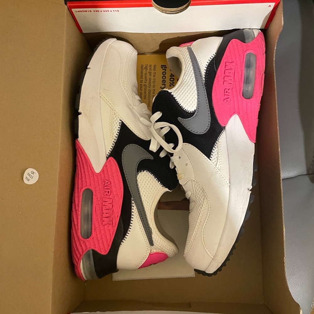 Nike sneakers, Colors are Pink/Black/White/gray            Pre owned